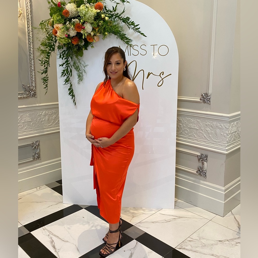 Orange dress from RNWY worn ONCE